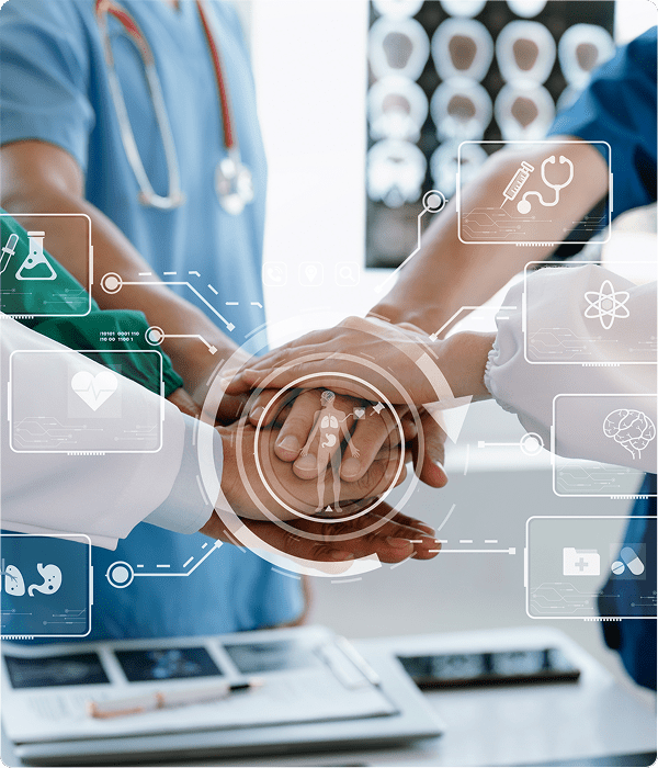 Healthcare professionals joining hands, teamwork concept.