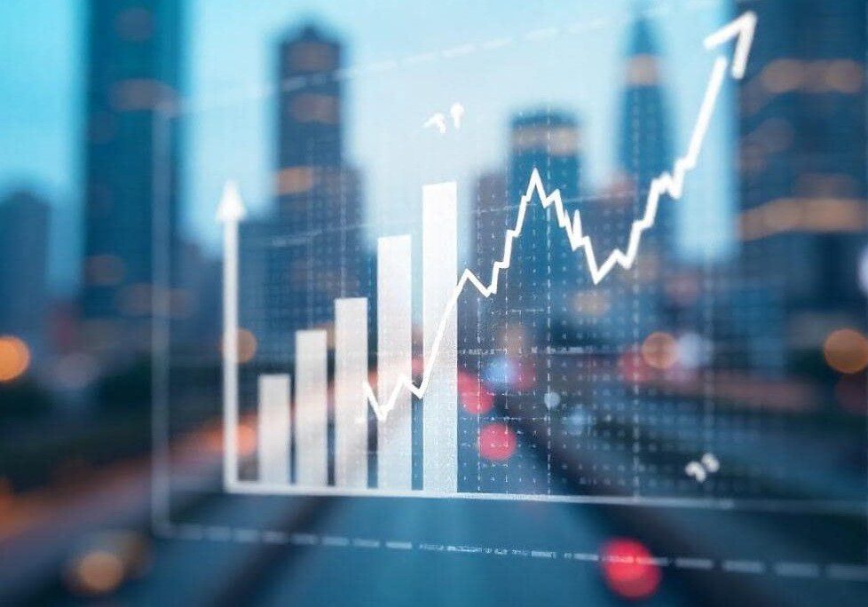 Rising graph with cityscape background, blurred lights.