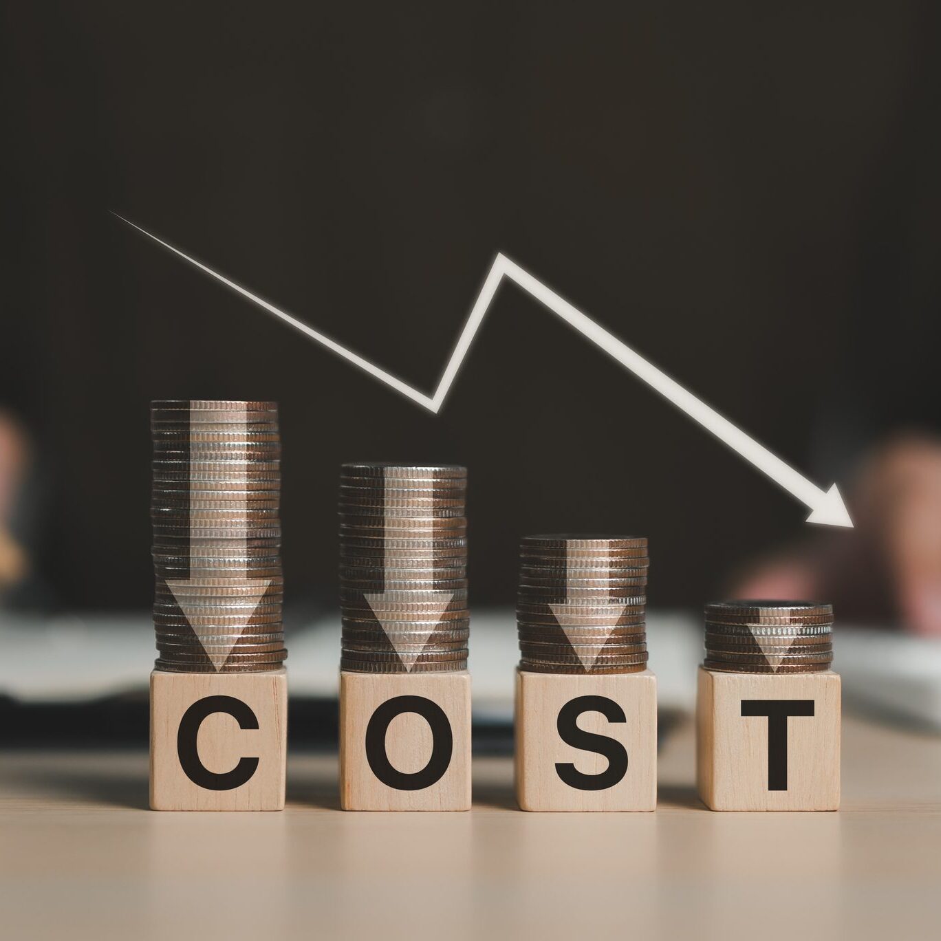 Coins decreasing, indicating cost reduction trend.